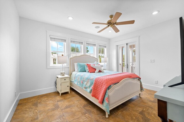 bedroom with ceiling fan and access to exterior