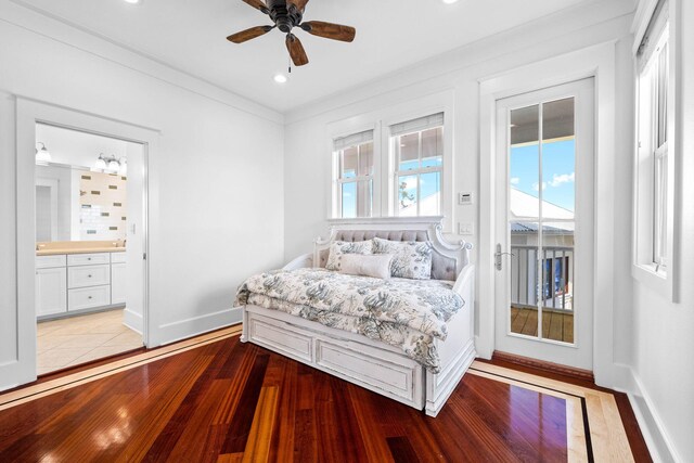 bedroom featuring access to exterior, ceiling fan, ensuite bathroom, and light hardwood / wood-style floors