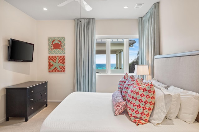 carpeted bedroom featuring ceiling fan