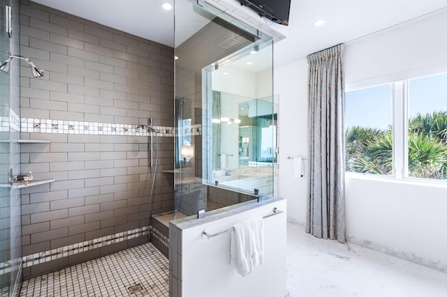 bathroom featuring a tile shower