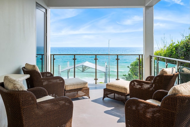 balcony featuring a water view