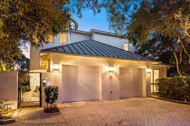 view of front of home featuring a garage