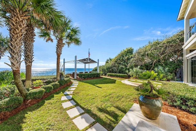 view of yard with a water view