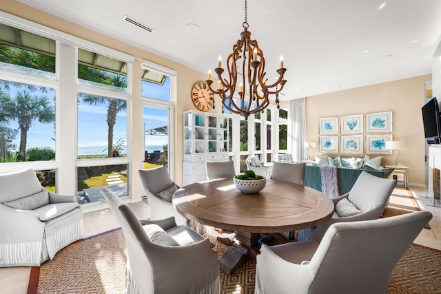 sunroom with an inviting chandelier and a healthy amount of sunlight