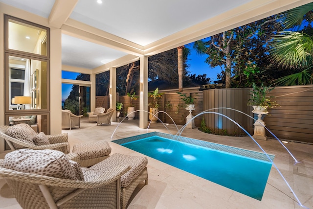 view of swimming pool featuring pool water feature, a patio area, and outdoor lounge area