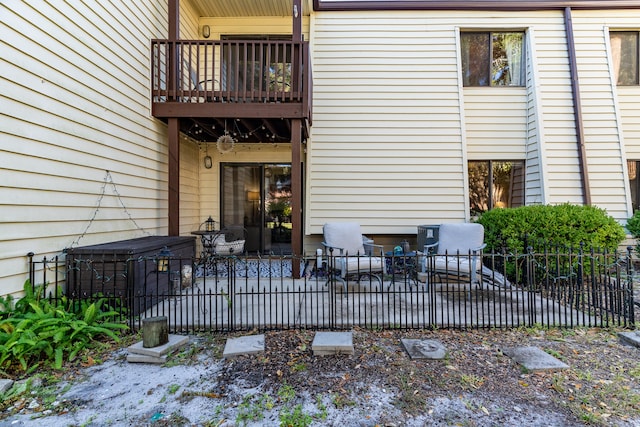 exterior space with a balcony and a patio