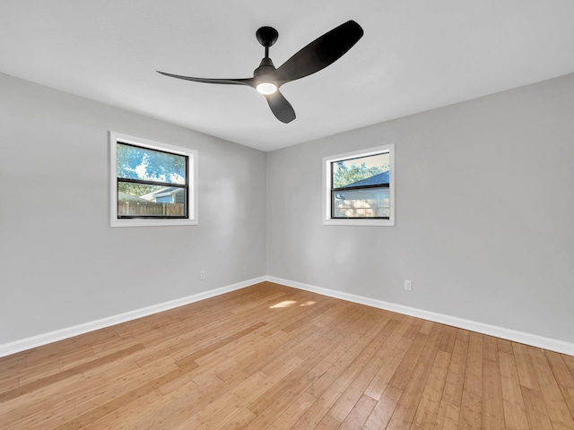 unfurnished room featuring ceiling fan and light hardwood / wood-style floors