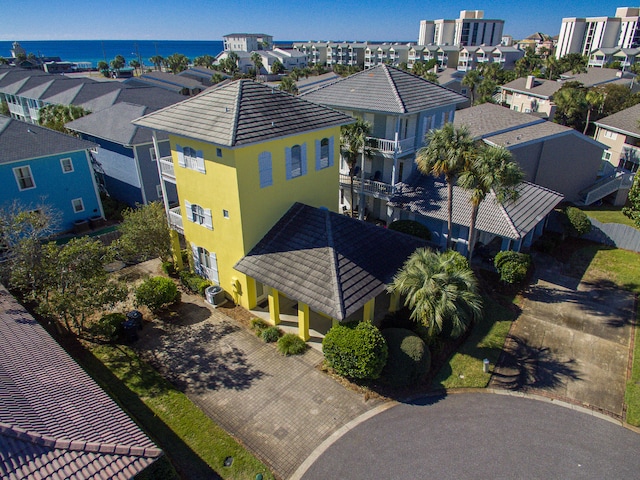 bird's eye view with a water view