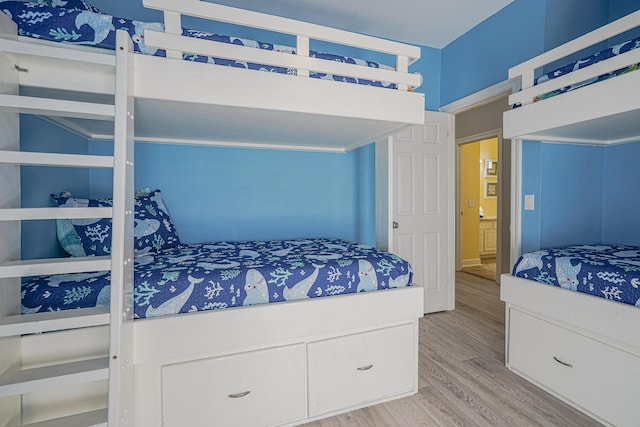 bedroom with light wood-style floors
