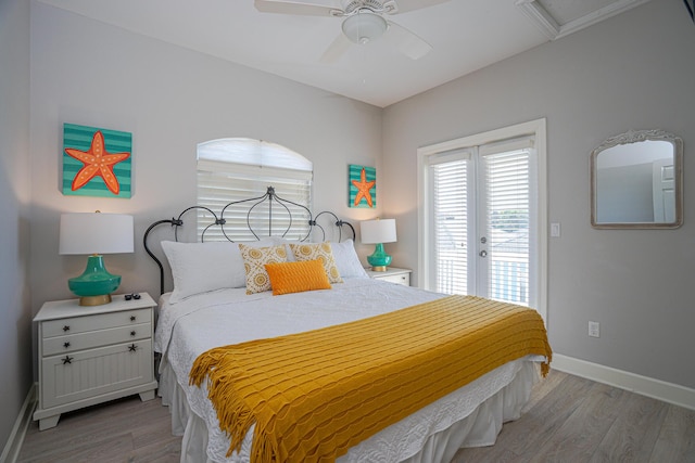 bedroom with light wood-style flooring, baseboards, access to outside, and a ceiling fan
