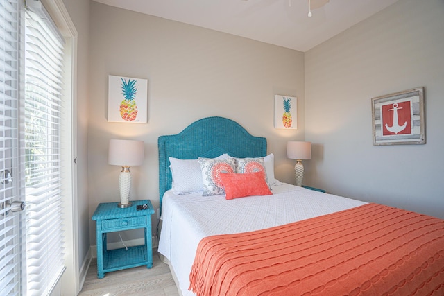 bedroom featuring ceiling fan and wood finished floors