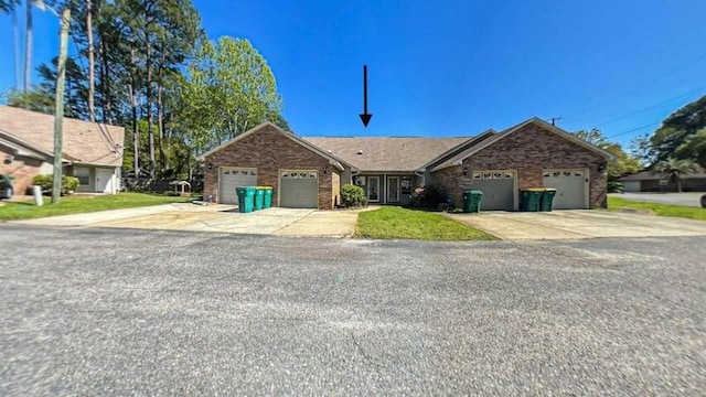 ranch-style home with a garage