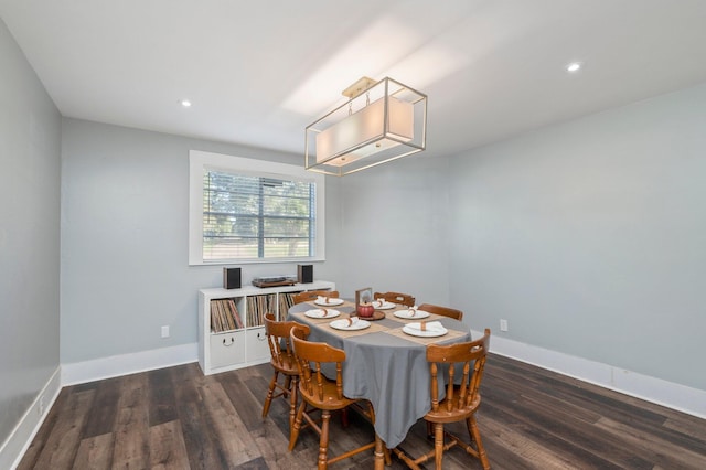 dining area featuring dark hardwood / wood-style flooring