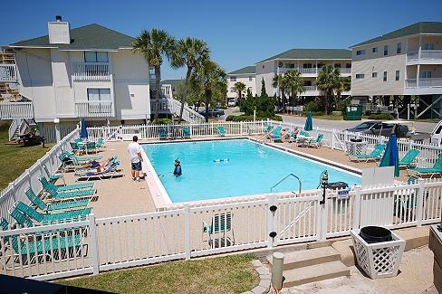 775 Gulf Shore Dr Unit 8101, Destin, FL 32541 - community pool with fence and a patio