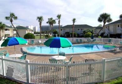 775 Gulf Shore Dr Unit 8101, Destin, FL 32541 - community pool featuring a patio and fence