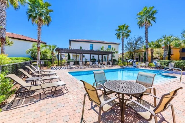 view of swimming pool featuring a patio