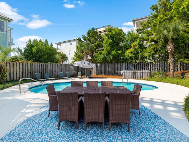 28 Sandcastle Ct, Santa Rosa Beach, FL 32459 - view of swimming pool featuring a patio area, a fenced in pool, and fence