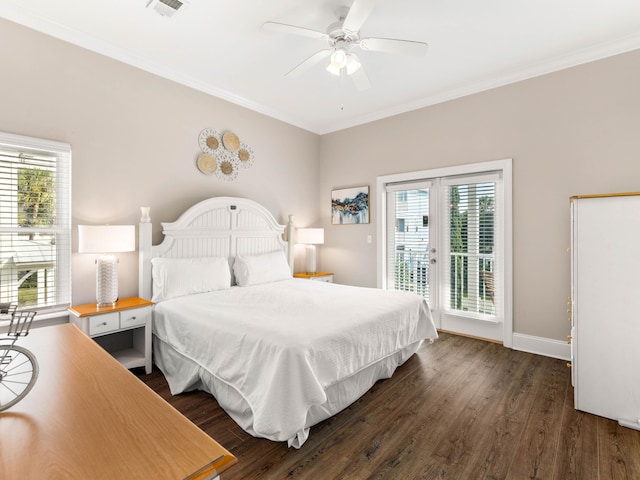 bedroom featuring dark wood-type flooring, multiple windows, access to outside, and ceiling fan