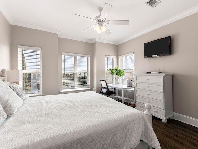 bedroom featuring ceiling fan, ornamental molding, multiple windows, and dark hardwood / wood-style floors