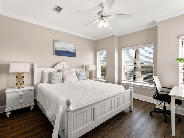 28 Sandcastle Ct, Santa Rosa Beach, FL 32459 - bedroom with baseboards, dark wood-style flooring, ornamental molding, and visible vents