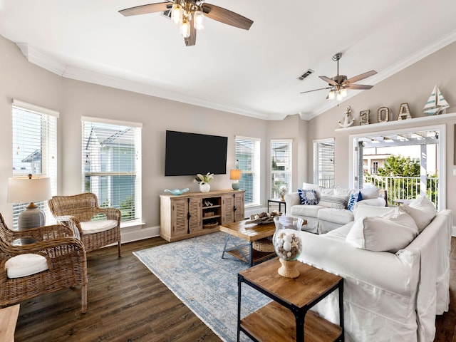 living room featuring lofted ceiling, crown molding, dark hardwood / wood-style floors, and plenty of natural light