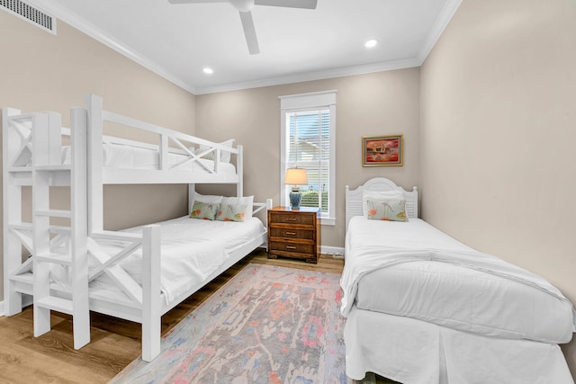 5378 Pine Ridge Ln Unit 5378, Miramar Beach, FL 32550 - bedroom with ornamental molding, wood finished floors, ceiling fan, recessed lighting, and baseboards