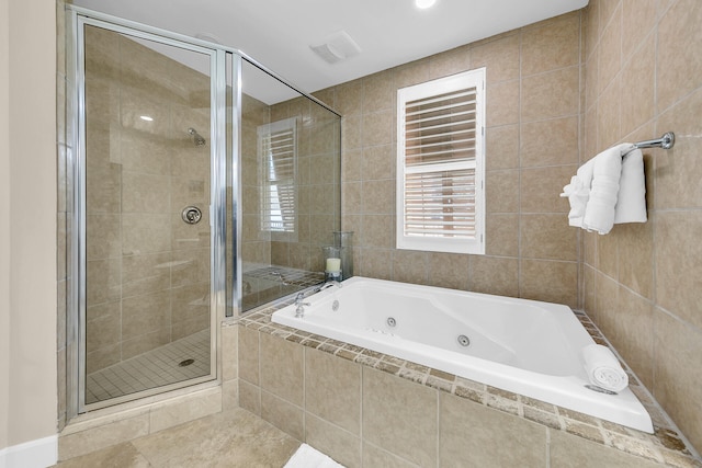 bathroom with plus walk in shower and tile patterned floors