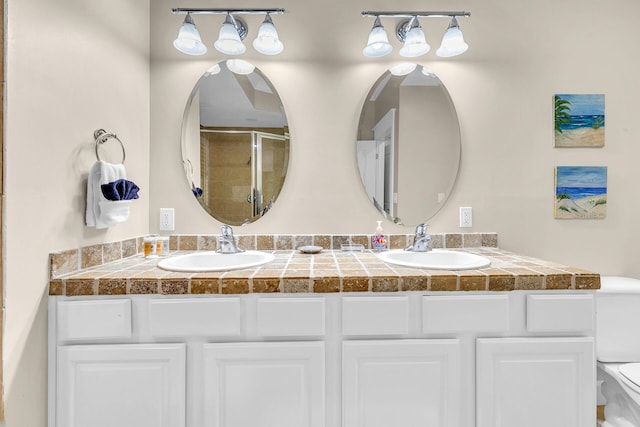 5378 Pine Ridge Ln Unit 5378, Miramar Beach, FL 32550 - full bath with double vanity, toilet, and an enclosed shower