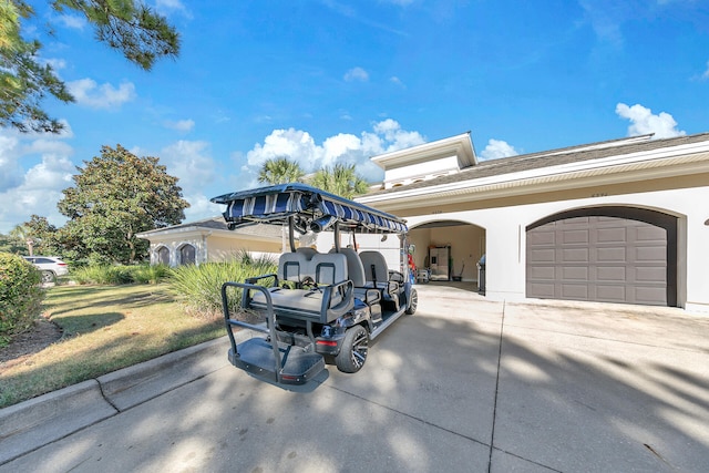 exterior space featuring a yard and a garage