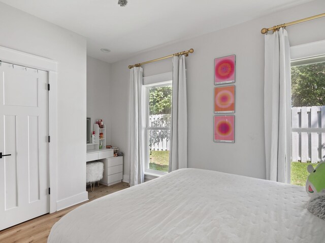 bedroom featuring hardwood / wood-style flooring