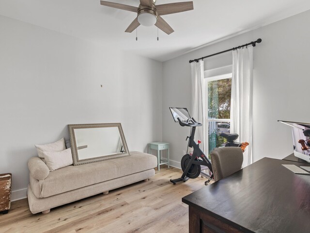 office area with ceiling fan and light hardwood / wood-style floors