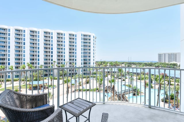 balcony featuring a water view