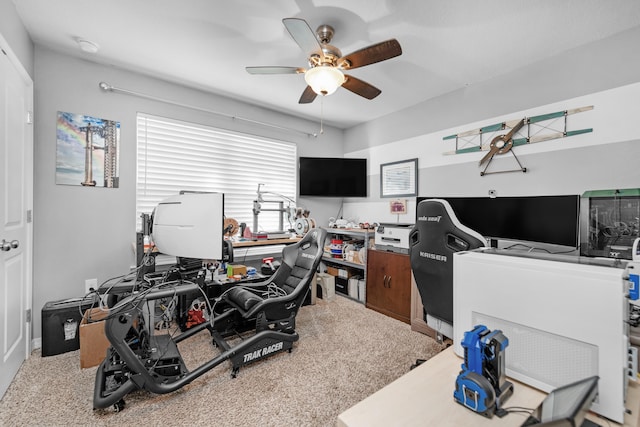 carpeted office with ceiling fan