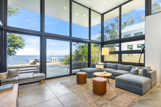 103 Native Tree Ln, Santa Rosa Beach, FL 32459 - building lobby with a towering ceiling, a water view, and expansive windows