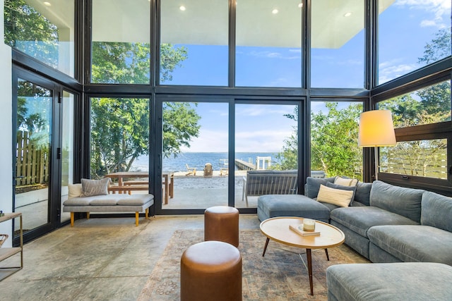 103 Native Tree Ln, Santa Rosa Beach, FL 32459 - living room featuring a water view, a high ceiling, and recessed lighting