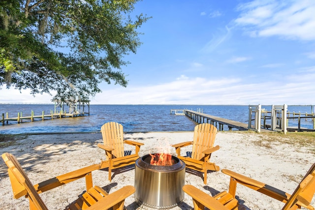 103 Native Tree Ln, Santa Rosa Beach, FL 32459 - dock area featuring a fire pit and a water view