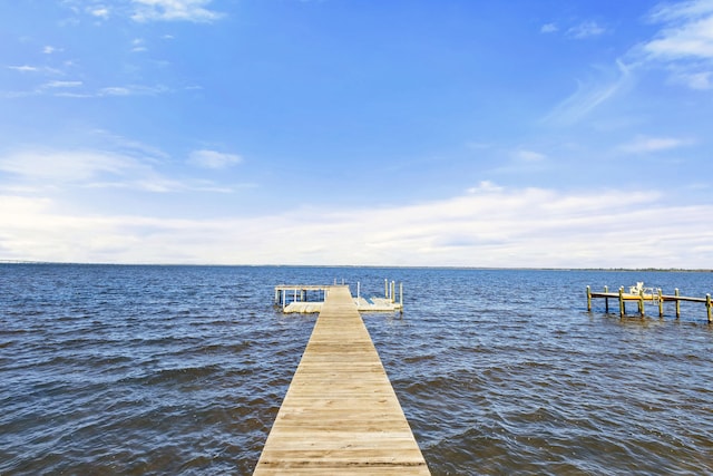 view of dock with a water view