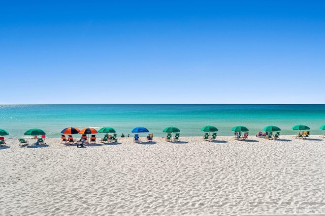 property view of water featuring a beach view