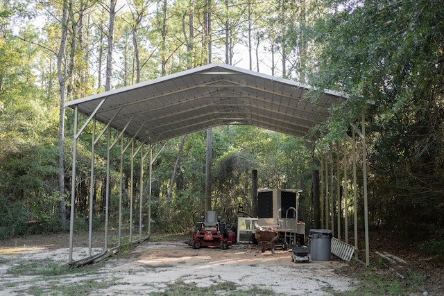 view of parking / parking lot with a carport