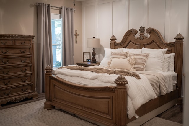 bedroom with wood-type flooring