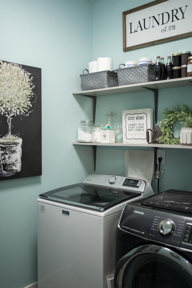 laundry area featuring washer and clothes dryer