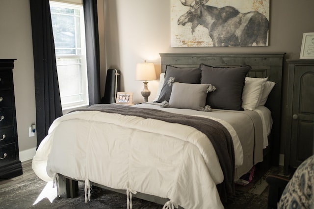 bedroom featuring hardwood / wood-style floors