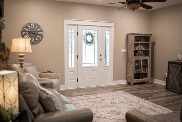 foyer featuring ceiling fan and dark hardwood / wood-style flooring