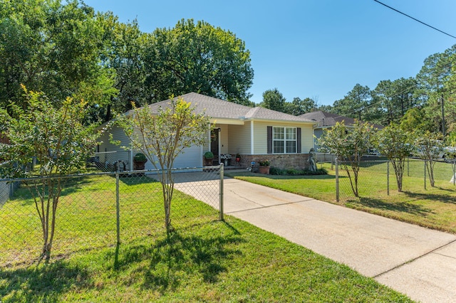 single story home with a front yard and a garage