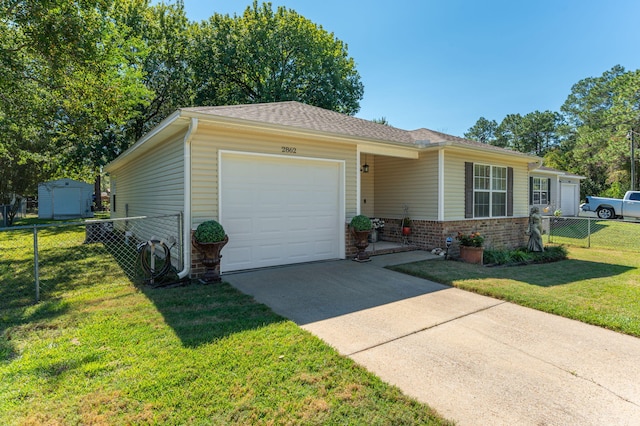 single story home with a front yard and a garage