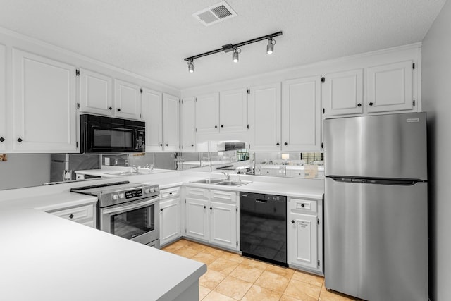 kitchen featuring a sink, black appliances, visible vents, white cabinetry, and light countertops