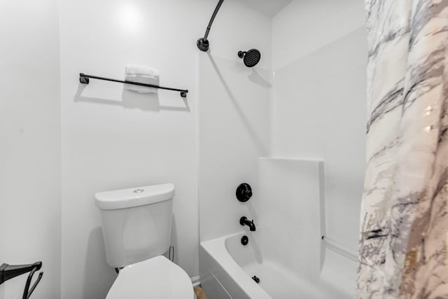 full bath featuring toilet and bathing tub / shower combination