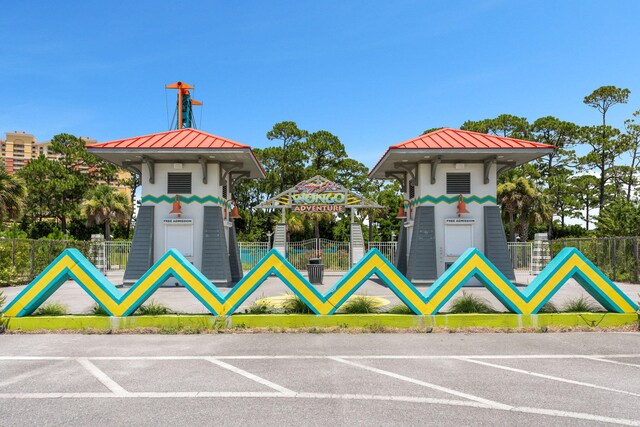 surrounding community featuring fence