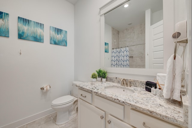 bathroom with vanity, tile patterned flooring, toilet, and curtained shower