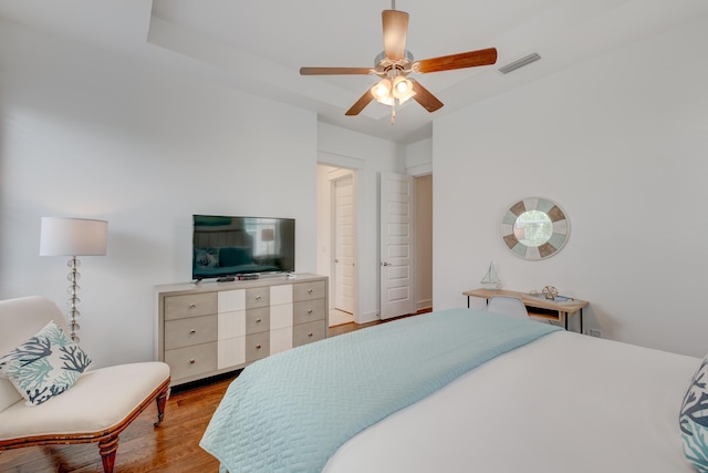 bedroom with light wood-type flooring and ceiling fan